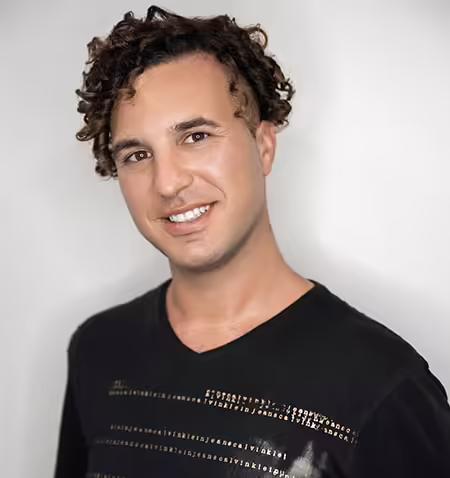 Dejan Rakic - weft hair extensions specialist at Glamorous Cayman Islands